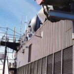 View of some some of the antennas mounted to the building itself on the south side of the roof. Needless to say, we experienced a small amount of intermod while standing here