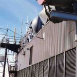 View of some some of the antennas mounted to the building itself on the south side of the roof. Needless to say, we experienced a small amount of intermod while standing here